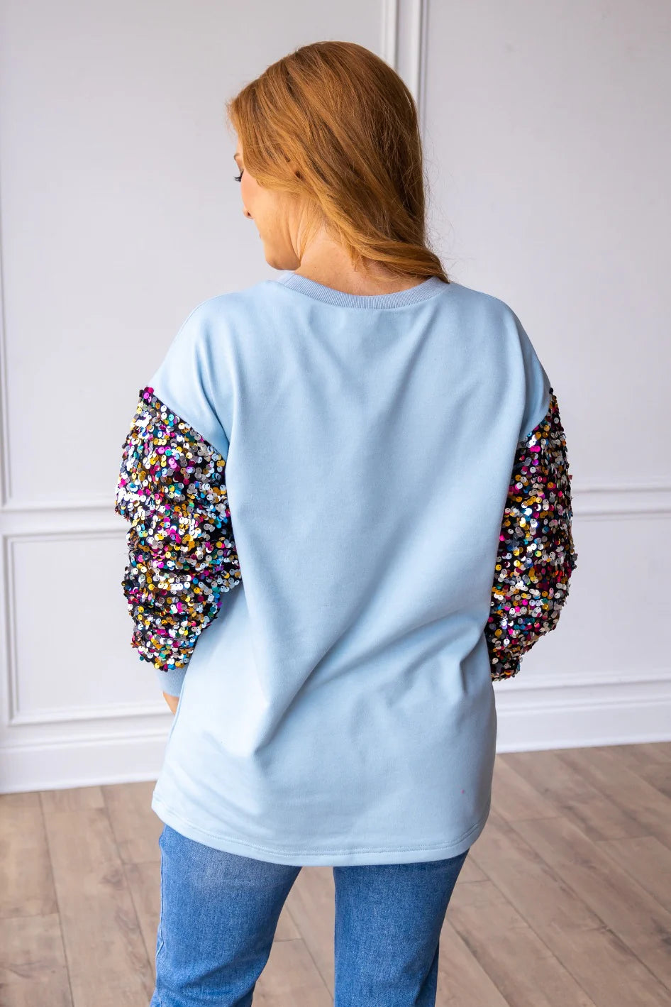NUTCRACKERS ON BLUE SWEATSHIRT WITH SEQUIN SLEEVES